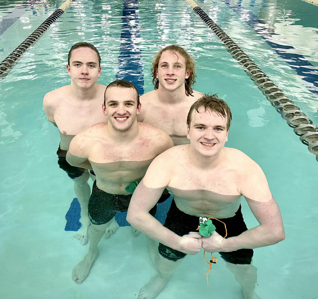 The Port Angeles 200 medley relay team has already set a state-qualifying time this season. From left, rear, are Adam Kaminski and Miles Van Denburg. From left, front, are Edward Gillespie and Thomas Jones. (Sally Cole)