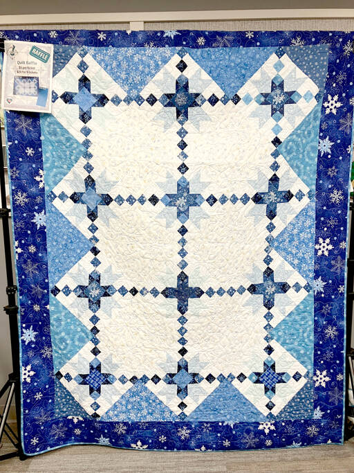 “Snowflake,” a handmade quilt by Nancy Foro, will be raffled to support Volunteer Hospice of Clallam County.