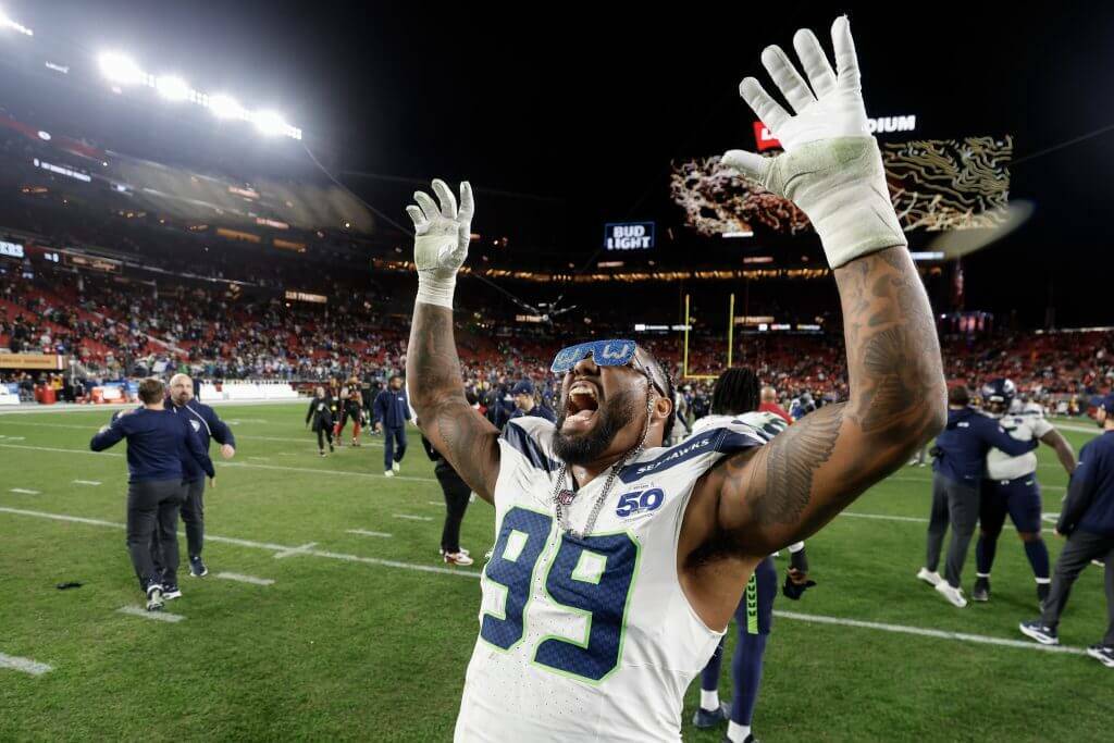 The Seahawks’ Leonard Williams celebrates Seattle’s 13-3 win over the San Francisco 49ers on Saturday night, locking up the NFC No. 1 seed. (Getty Images)