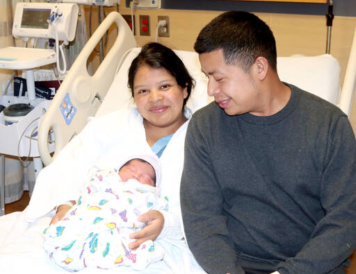Raquel Matiase-Pablo and Ruben Rameriz of Forks welcomed Helen into the world at 6:28 p.m. on Friday, the first baby born on the North Olympic Peninsula in 2026. Helen weighed 8 pounds, 4 ounces and has three siblings ages 9, 5 and 1. Matiase-Pablo, who speaks three languages, said she migrated to the United States more than 10 years ago. (Dave Logan/for Peninsula Daily News)