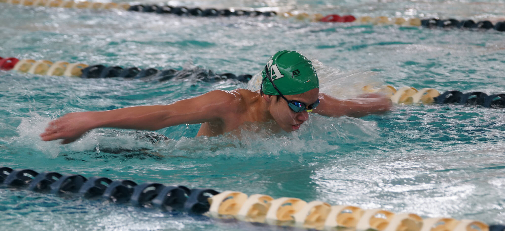 Port Angeles Swim & Dive
Port Angeles freshman Jebow Nabua swims the 100-yard butterfly competitively for the first time during the Roughriders’ 136-46 boys swim and dive meet victory over Olympic at Shore Aquatic Center on Wednesday.