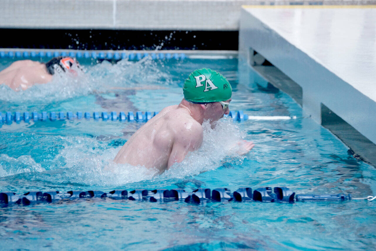 Port Angeles’ Edward Gillespie competes in the 100 breaststroke at the Swimvitational at the Olympic Aquatic Center in Silverdale. (Linda Adams)
