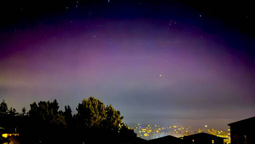 The aurora borealis shines over Port Townsend late Monday night. Ideal conditions to view the event are from about 9 p.m. to 3 a.m. with clear skies and away from city lights or higher locations with northern views. (Steve Mullensky/for Peninsula Daily News)